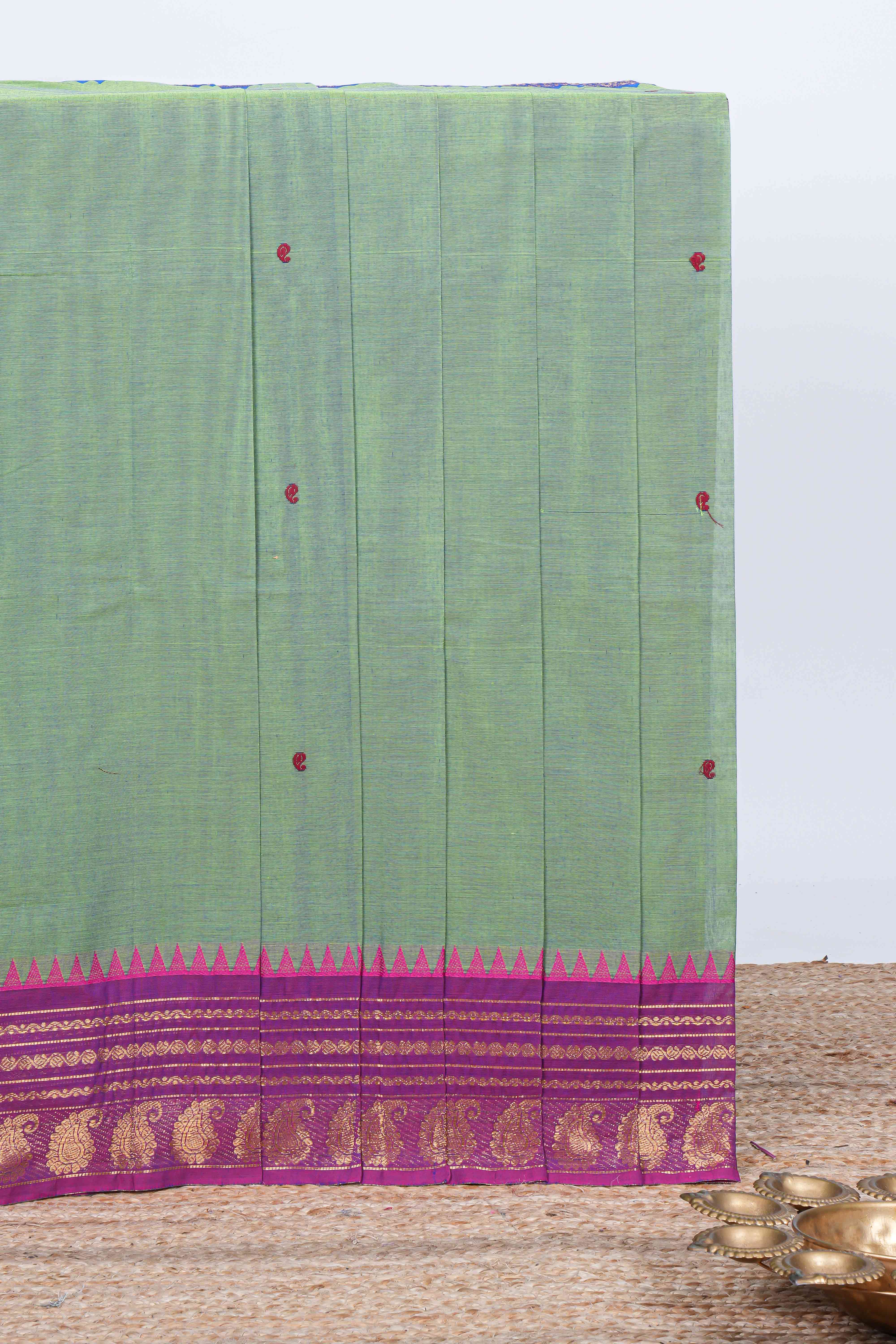 Emerald green thread butta chettinad cotton saree with contrast border and matching striped pallu