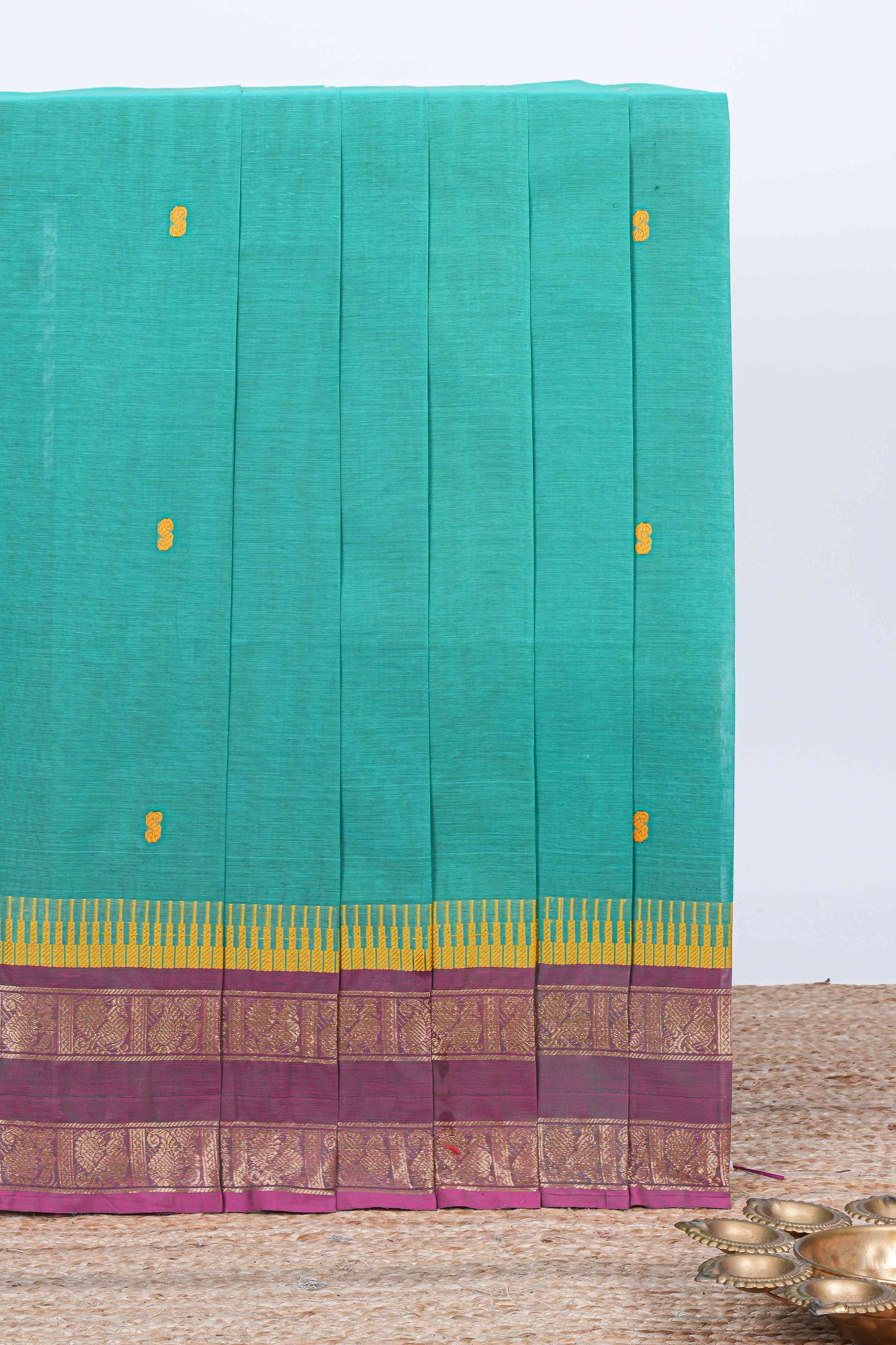 Turquoise green thread butta chettinad cotton saree with contrast border and matching striped pallu