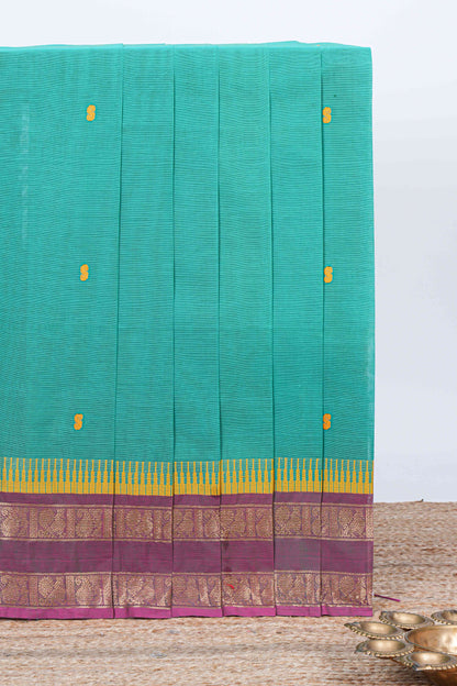 Turquoise green thread butta chettinad cotton saree with contrast border and matching striped pallu