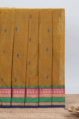 Mustard yellow chettinad cotton saree with all over thread buttas contrast border and matching pallu along with blouse piece