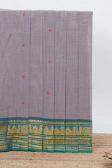 Grey colour chettinad cotton saree all over thread butta with contrast border and matching pallu along with blouse
