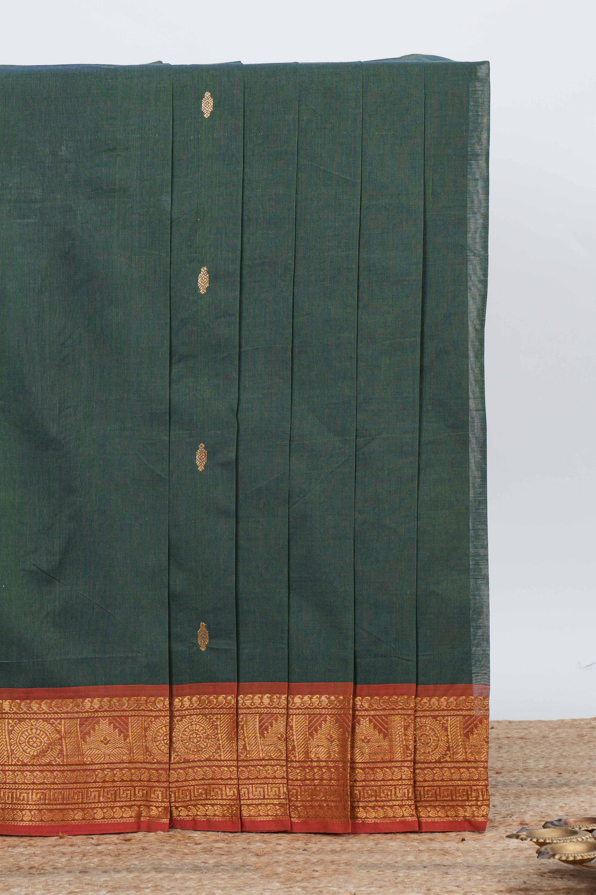Bottle green colour chettinad cotton saree all over thread butta with contrast border and zari pallu along with blouse