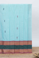 sky blue colour chettinad cotton saree all over thread butta with contrast border and zari pallu along with blouse