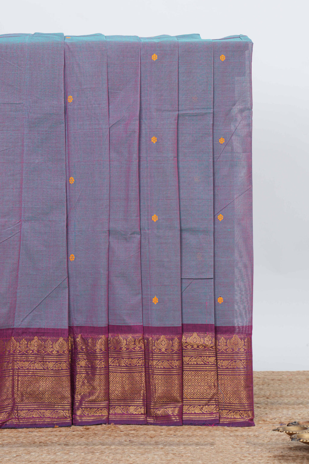 Lavender colour chettinad cotton saree all over thread butta with contrast border and self pallu along with blouse piece