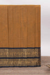 Deep Mustard yellow Chettinad cotton saree with a plain body antique gold zari elephant border along with matching blouse