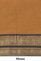 Deep Mustard yellow Chettinad cotton saree with a plain body antique gold zari elephant border along with matching blouse