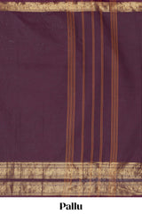 Dark brown Chettinad cotton saree with a plain body antique gold zari elephant retta petta border along with matching blouse