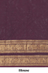Dark brown Chettinad cotton saree with a plain body antique gold zari elephant retta petta border along with matching blouse