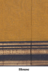 Deep Mustard yellow Chettinad cotton saree with a plain body and a contrasting black border by antique gold zari motifs along with blouse piece