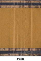 Mustard yellow Chettinad cotton saree with a plain body and a contrasting black border by intricate antique gold zari motifs along with blouse piece