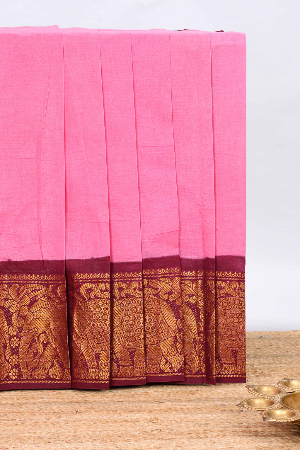 Pink plain chettinad cotton saree with contrast zari border and striped pallu