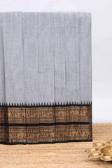 Grey plain chettinad cotton saree with contrast zari bentex border and matching blouse