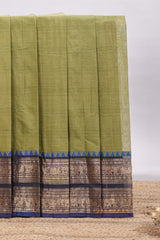 Olive green plain chettinad cotton saree with contrast bentex zari border and matching blouse