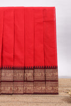 Red plain chettinad cotton saree with contrast zari border and matching blouse