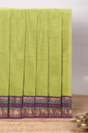 Green plain chettinad cotton saree with contrast zari border and matching blouse