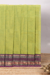 Green plain chettinad cotton saree with contrast zari border and matching blouse