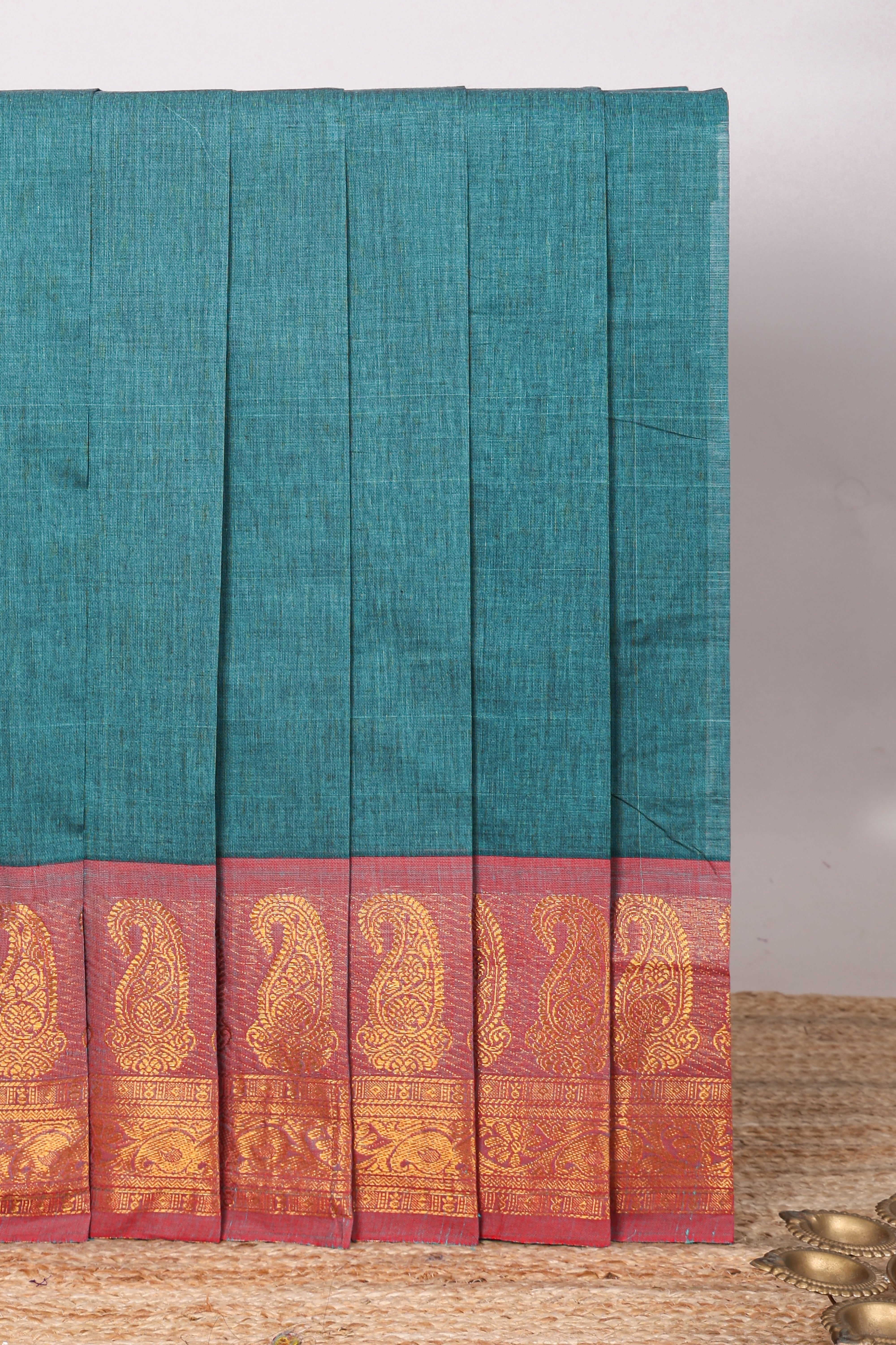 Midnight green plain chettinad cotton saree with contrast zari border and matching blouse