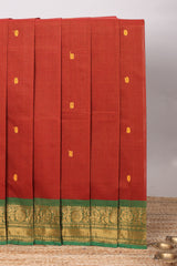 Orange butta chettinad cotton saree with contrast zari border and matching blouse