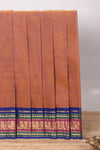 Peach plain chettinad cotton saree with contrast zari border and matching blouse