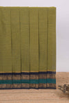 Green plain chettinad cotton saree with contrast zari border and matching blouse