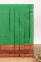 Forest green motifs design chettinad cotton saree with contrast zari border and matching blouse