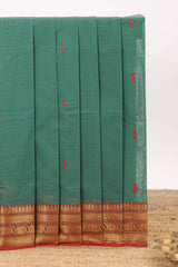 Sea green motifs design chettinad cotton saree with contrast zari border and matching blouse