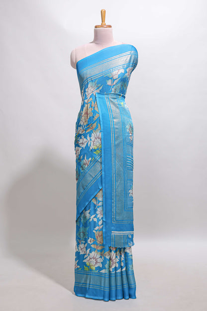 Sky blue floral design chiffon saree with self border and matching blouse