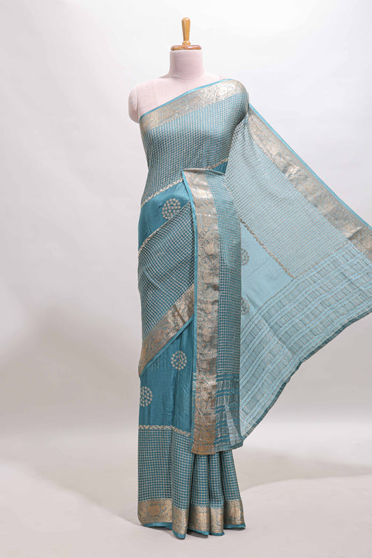 Turquoise blue checked floral motifs chiffon saree with self zari border and contrast blouse
