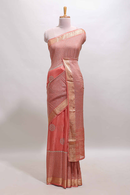 Peach checked floral motifs chiffon saree with self zari border and contrast blouse