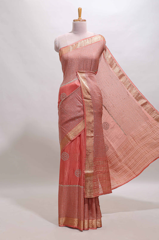 Peach checked floral motifs chiffon saree with self zari border and contrast blouse