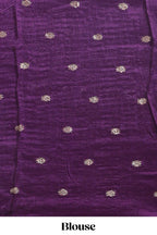 Peach checked floral motifs chiffon saree with self zari border and contrast blouse
