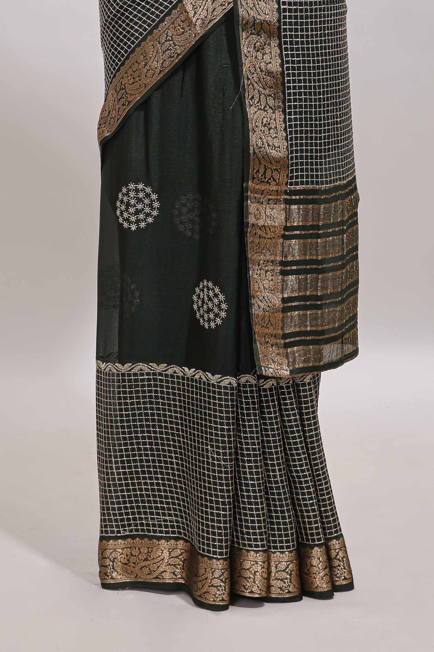 Black checked floral motifs chiffon saree with self zari border and contrast blouse