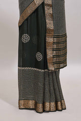Black checked floral motifs chiffon saree with self zari border and contrast blouse