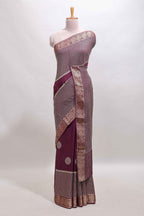 Purple checked floral motifs chiffon saree with self zari border and contrast blouse