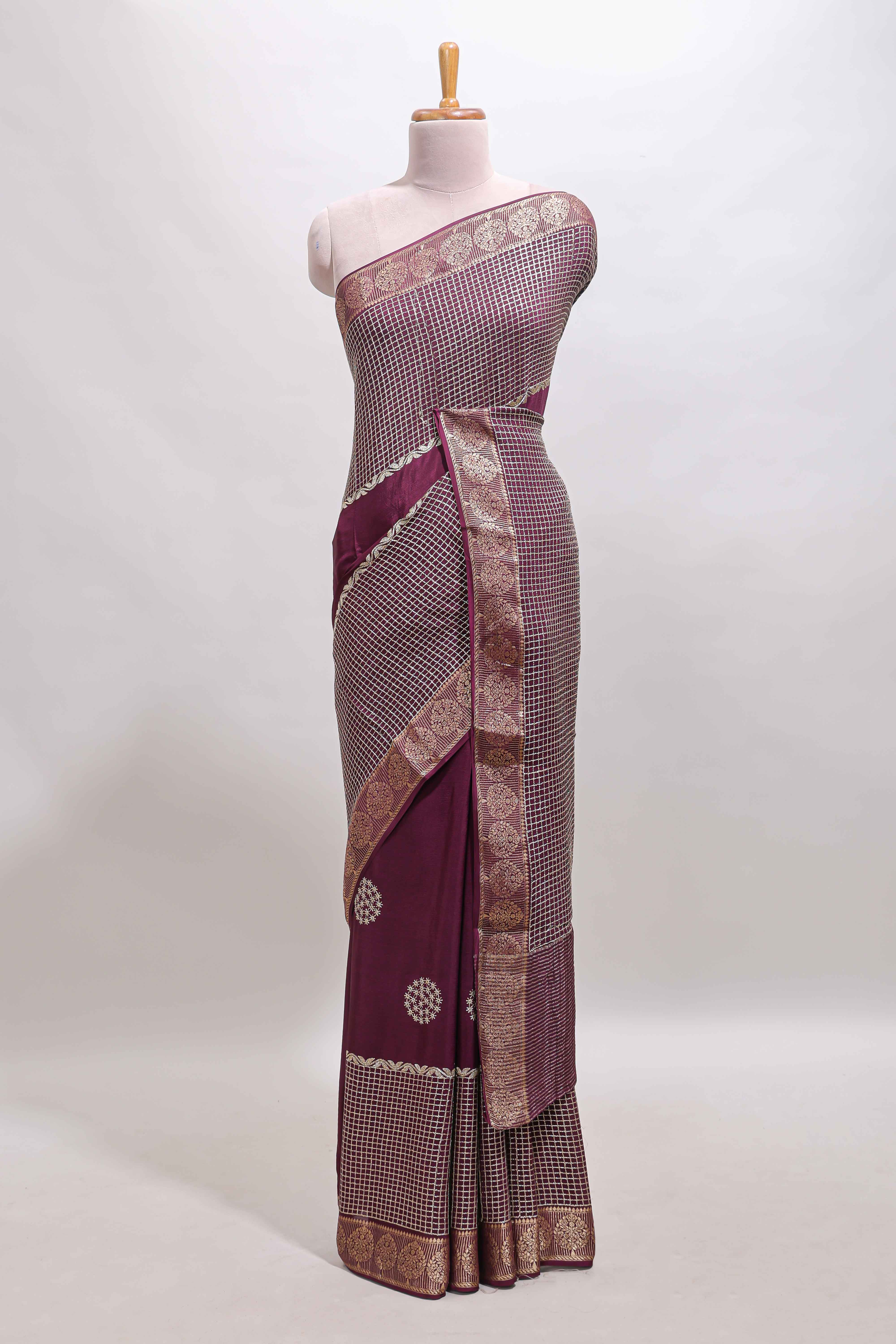Purple checked floral motifs chiffon saree with self zari border and contrast blouse