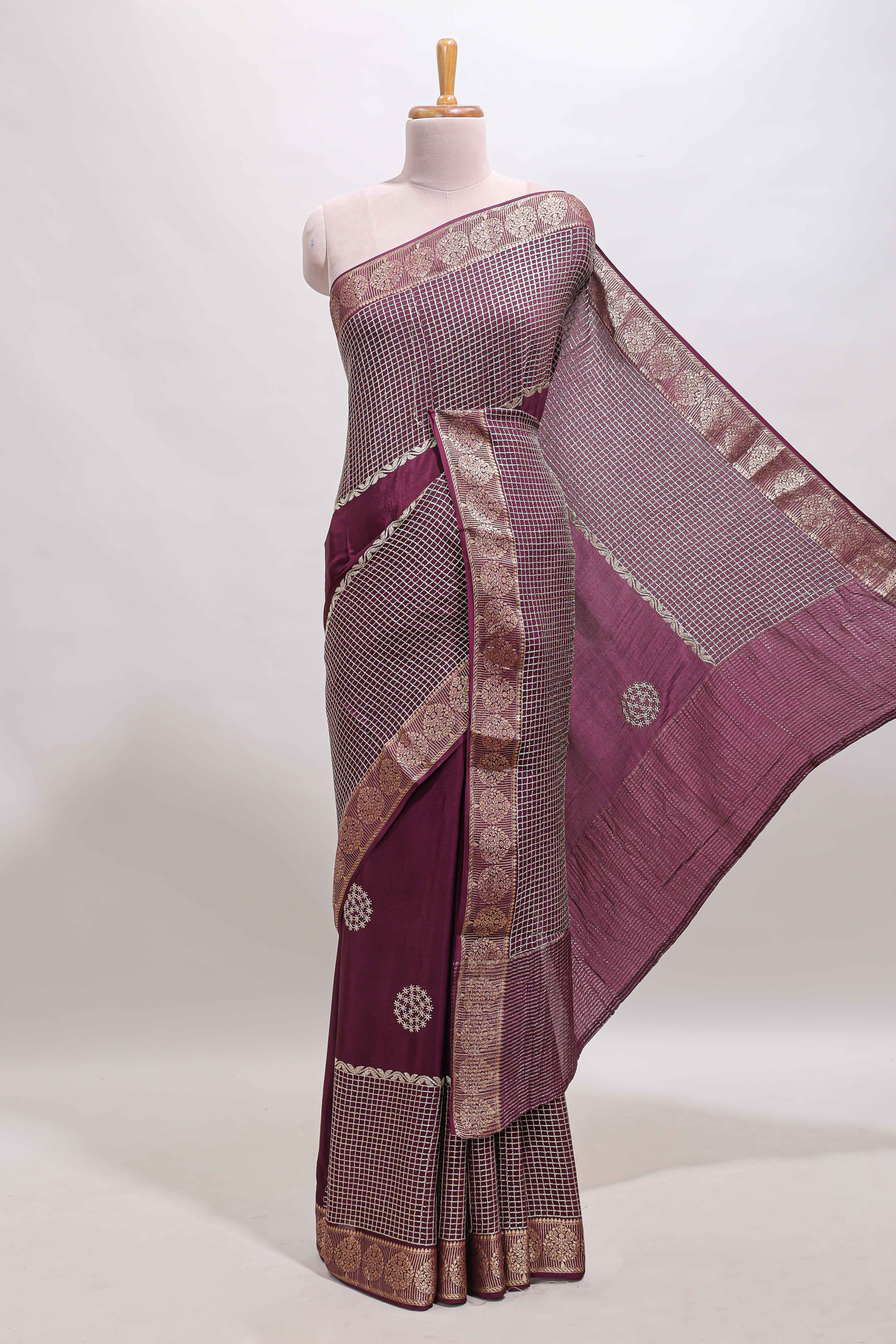 Purple checked floral motifs chiffon saree with self zari border and contrast blouse