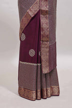 Purple checked floral motifs chiffon saree with self zari border and contrast blouse