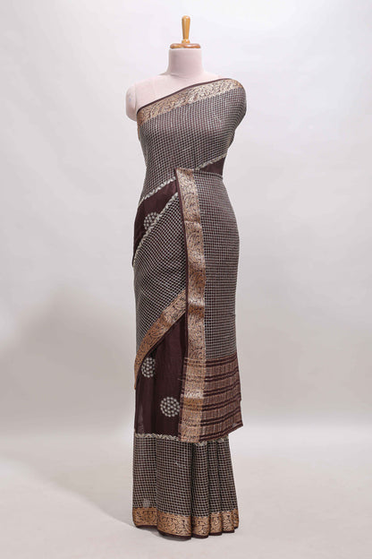 Brown checked floral motifs chiffon saree with self zari border and contrast blouse