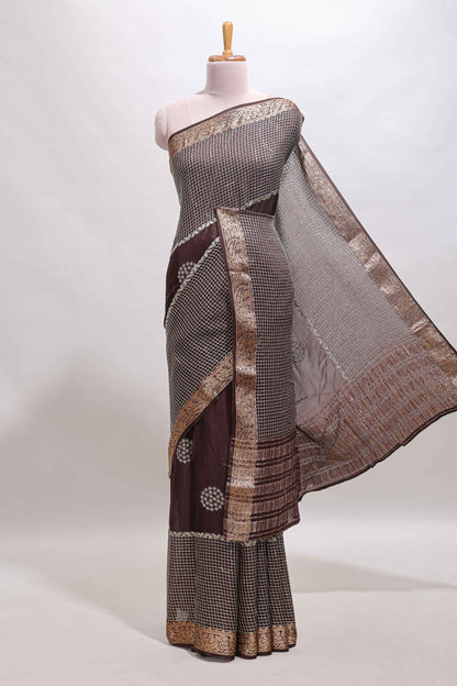 Brown checked floral motifs chiffon saree with self zari border and contrast blouse