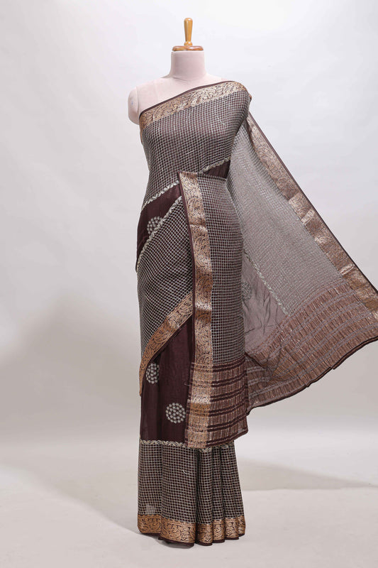 Brown checked floral motifs chiffon saree with self zari border and contrast blouse