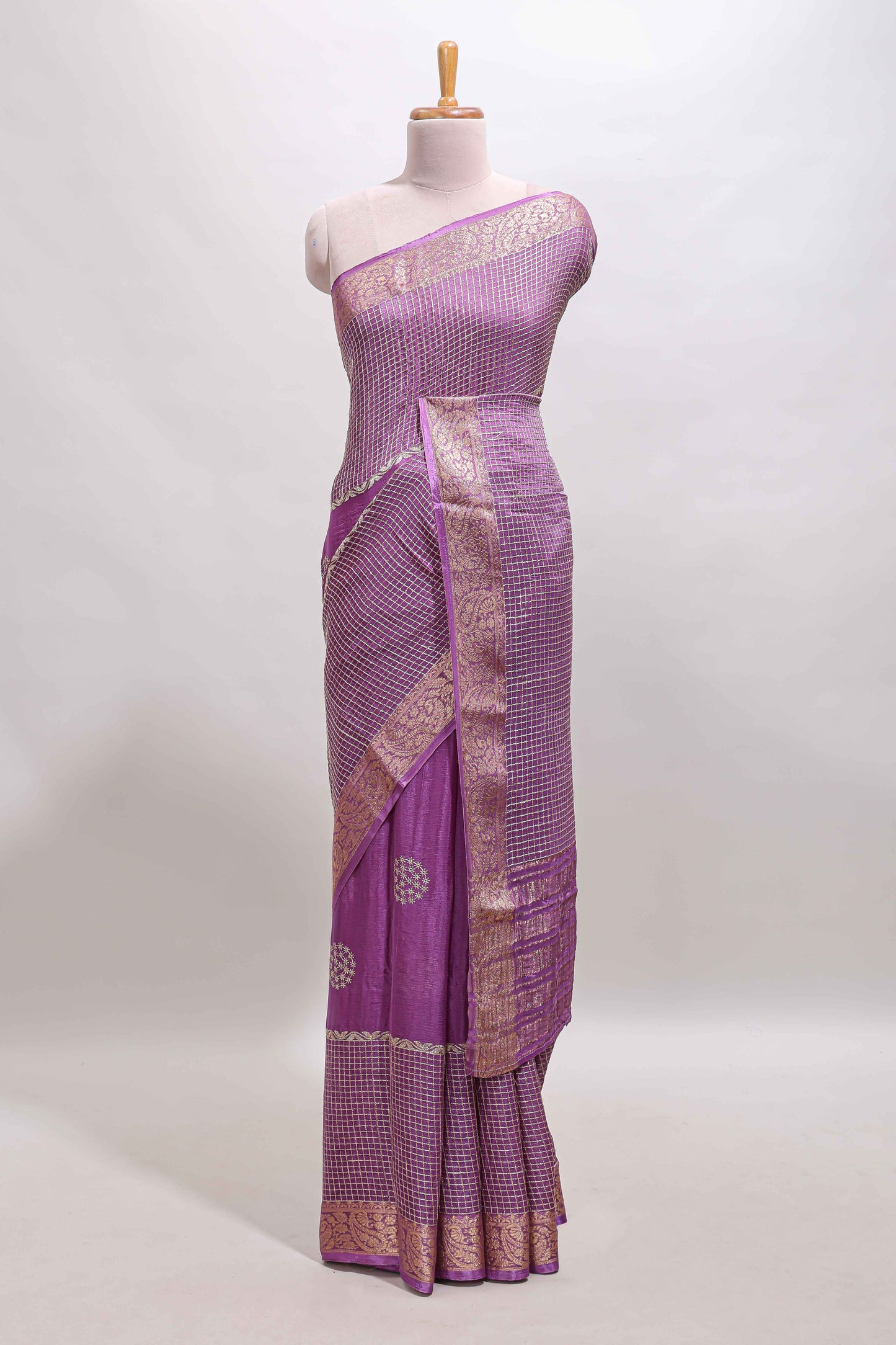 Lavender checked floral motifs chiffon saree with self zari border and contrast blouse