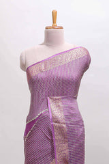 Lavender checked floral motifs chiffon saree with self zari border and contrast blouse