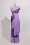 Purple checked floral motifs chiffon saree with self zari border and contrast pallu and blouse