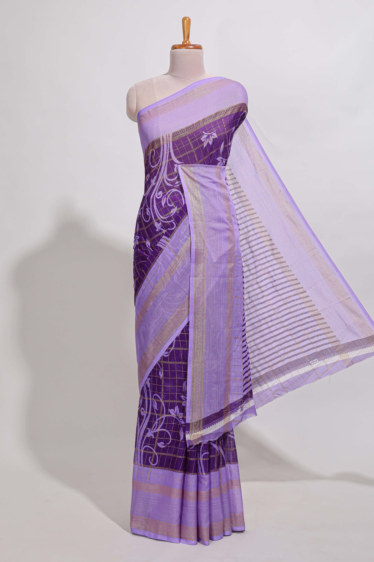 Purple checked floral motifs chiffon saree with self zari border and contrast pallu and blouse