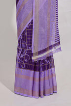 Purple checked floral motifs chiffon saree with self zari border and contrast pallu and blouse