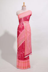 Rani pink checked floral motifs chiffon saree with self zari border and contrast blouse