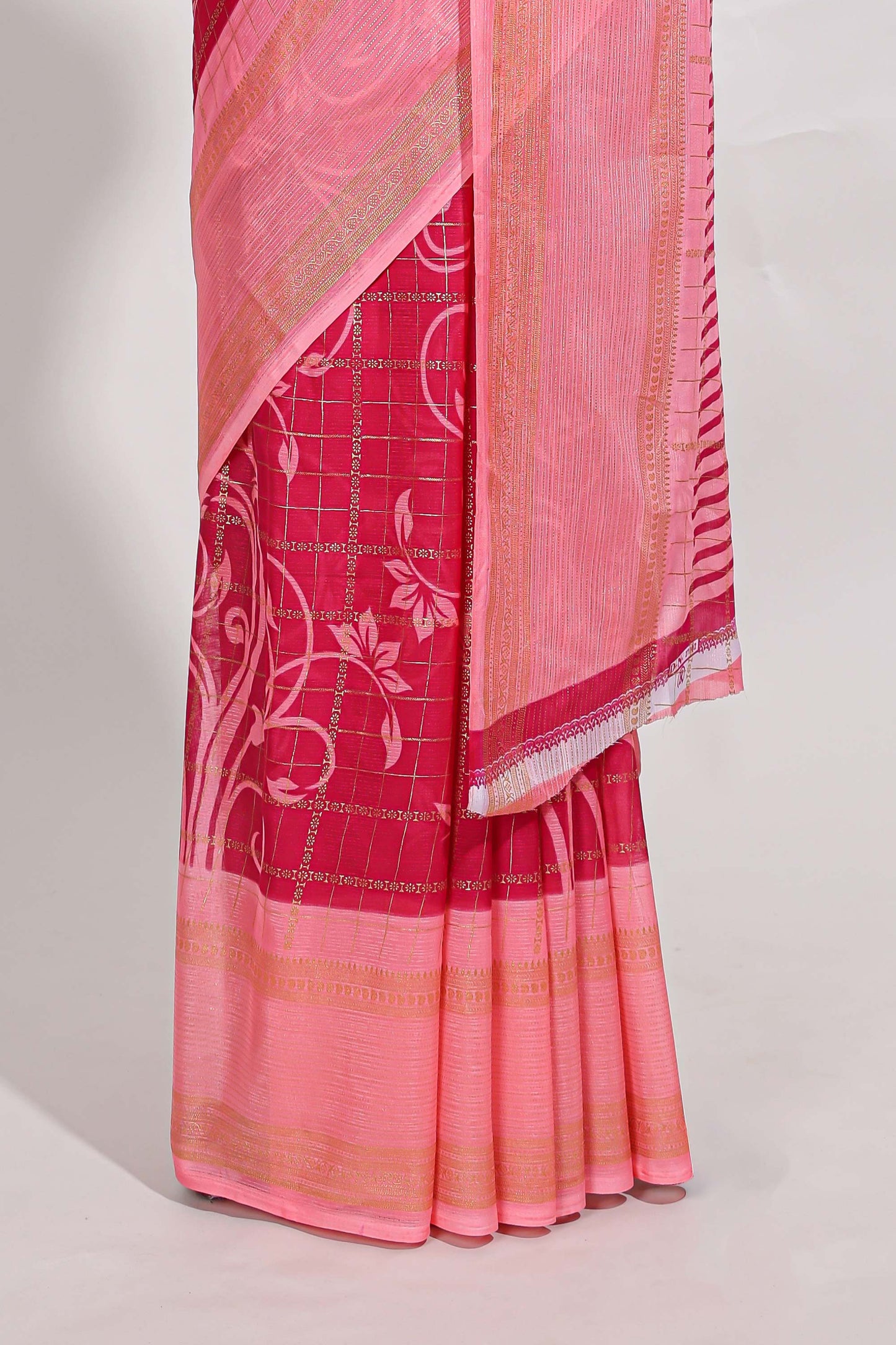 Rani pink checked floral motifs chiffon saree with self zari border and contrast blouse