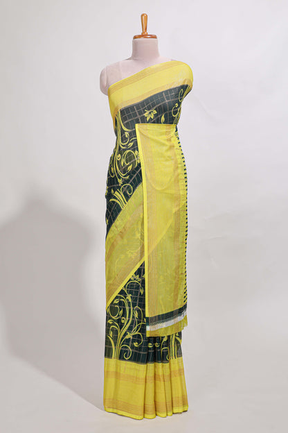Green checked floral motifs chiffon saree with self zari border and contrast blouse