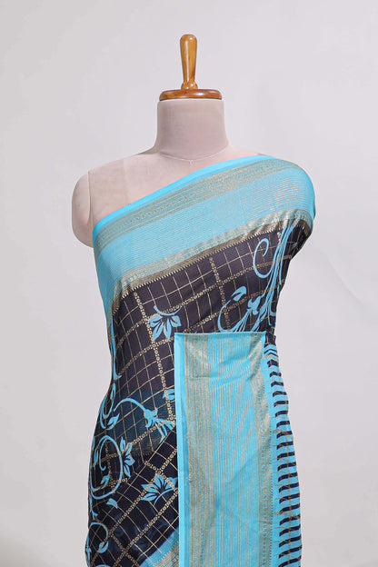 Navy blue checked floral motifs chiffon saree with self zari border and contrast blouse