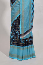 Navy blue checked floral motifs chiffon saree with self zari border and contrast blouse
